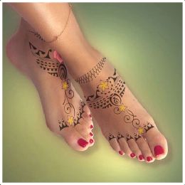Top of foot tattoo: Beauty