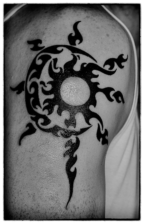 Alessio - Tribal sun moon tattoo