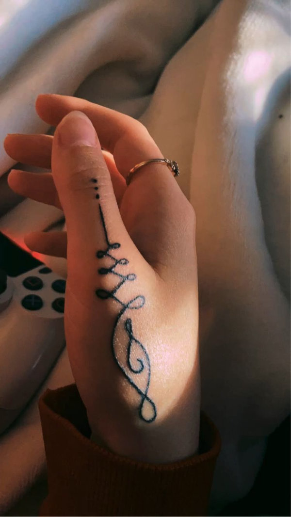 Alisandra - Unalome tattoo