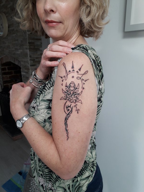 Angela - Family lotus tattoo photo