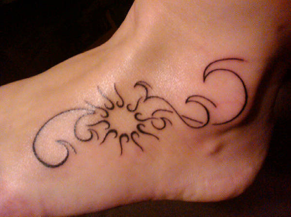 Carly - Sun waves tattoo photo