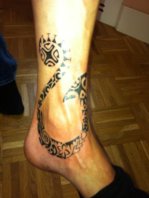 Christian - Matau tattoo photo