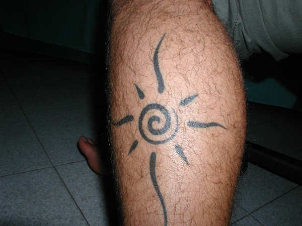 Davide - sole con spirale tattoo