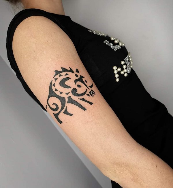 Elisa - G+C boar tattoo