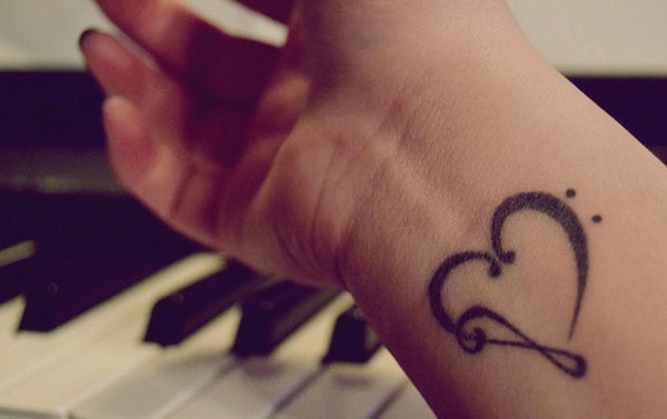 Elle - Musical heart tattoo photo