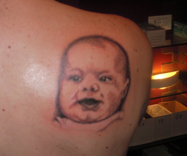 Evil Zone - Baby portrait tattoo