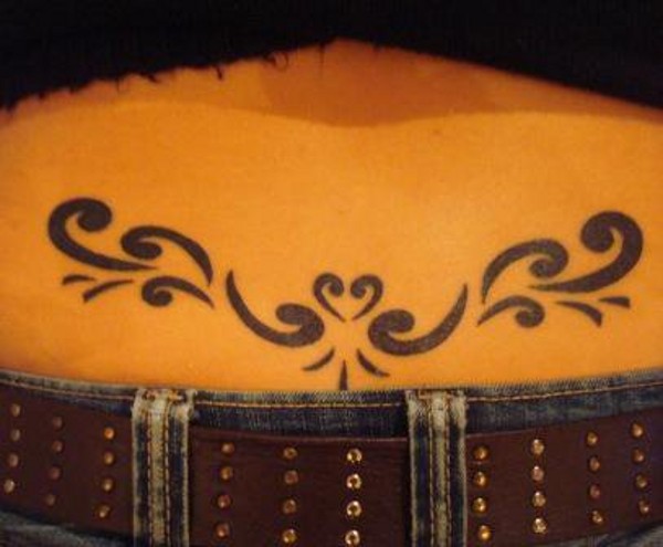 Gabi - Koru lowerback tattoo photo