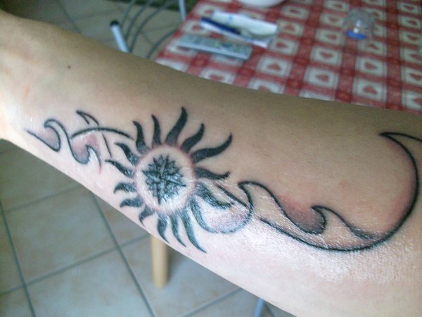 Giuseppe - Sun, wind, waves tattoo photo