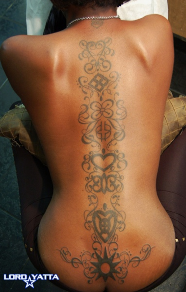 Guest - Adinkra backbone tattoo