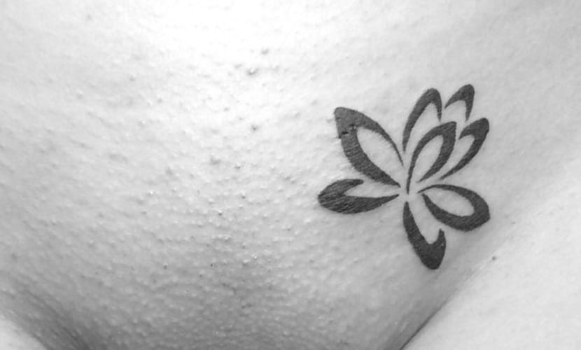 Guest - Lotus flower tattoo