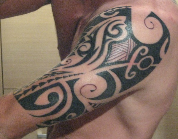 James - Polynesian arn outside tattoo photo