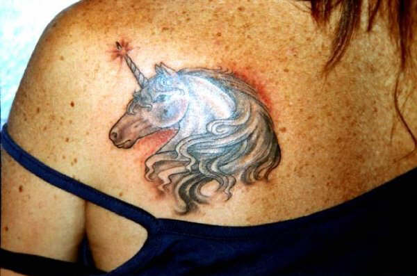 Jex - Unicorn tattoo photo