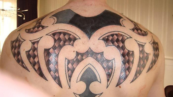 Maikel - Maori-like backpiece tattoo