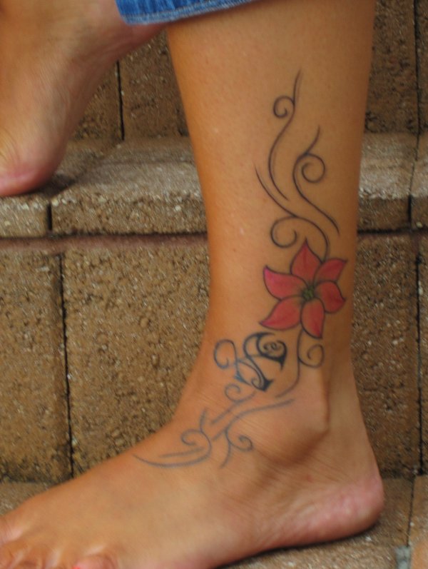 Rebecca - Heartigram and flowers tattoo photo