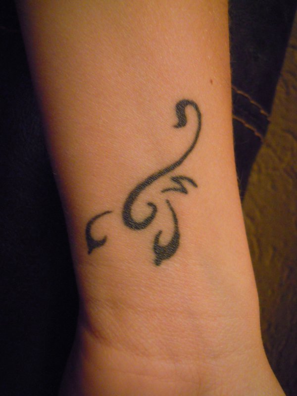 Renata - Stylized scorpion tattoo photo