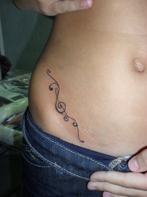 Rosanna - Treble clef swirls tattoo photo