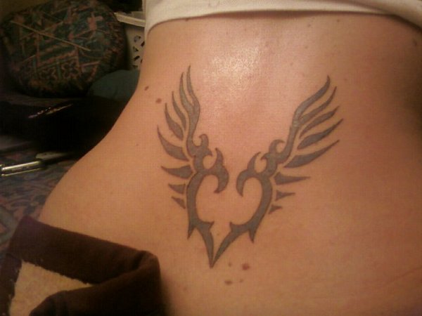 Rosaria - Tribal winged heart tattoo