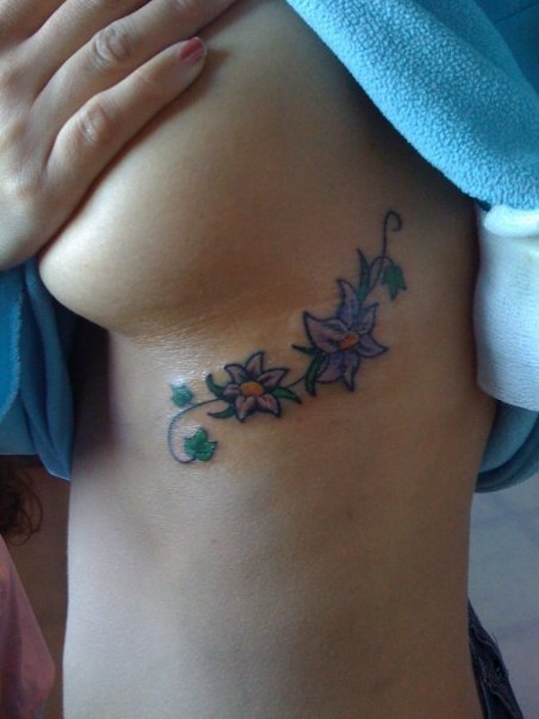 Sara - Ivy and flowers tattoo photo