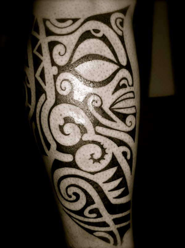 Tanne - Polynesian tiki tattoo photo