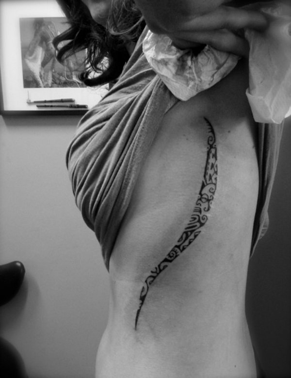 Tanne - ribcage tattoo