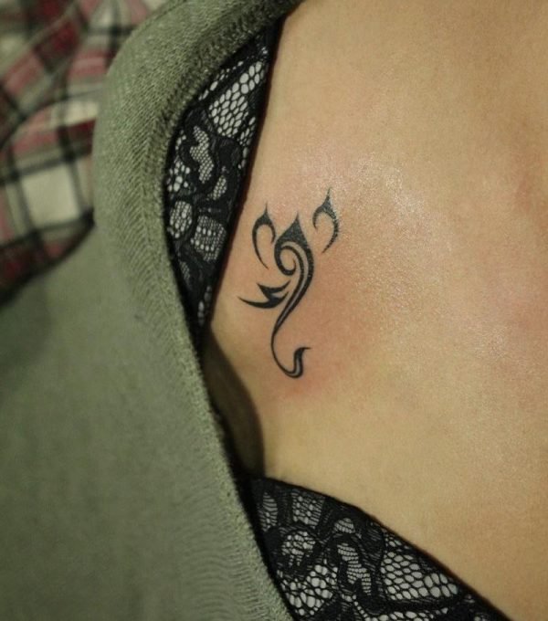 Guest - Stylized scorpion tattoo photo