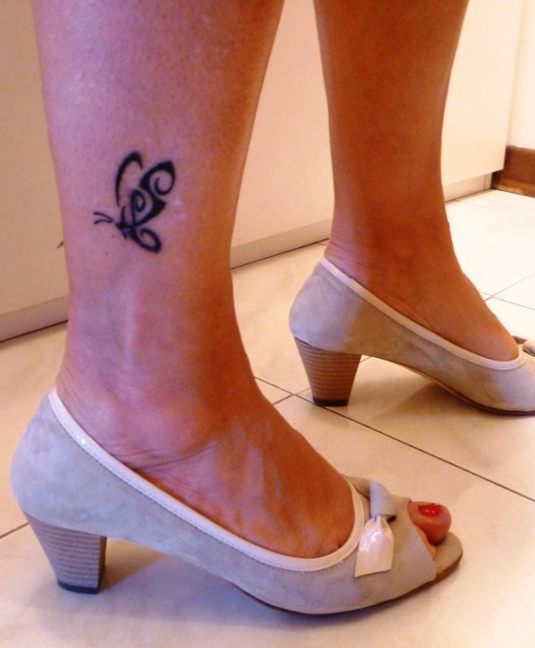 Sara - S+L butterfly tattoo photo